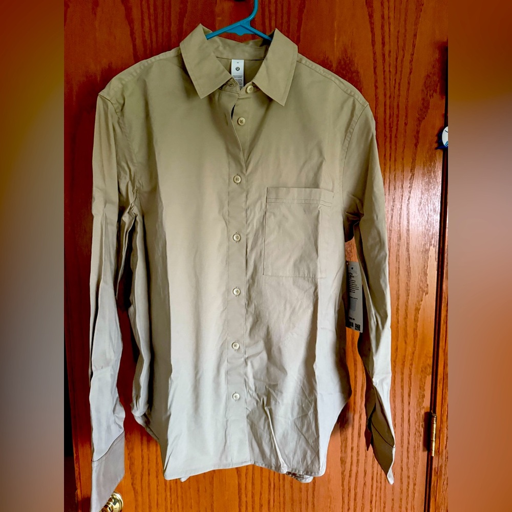 Women’s oversized button down shirt.